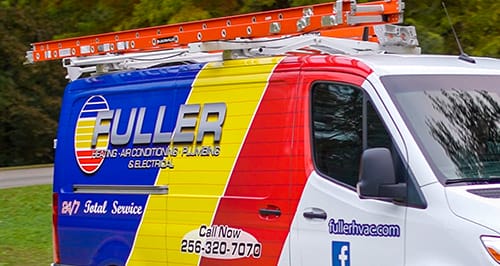 Brightly wrapped Fuller heating, air conditioning, plumbing, and electrical service van on the road.